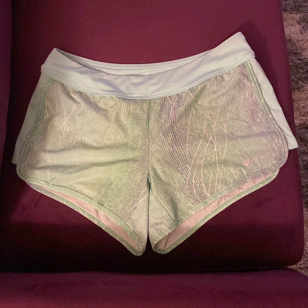 Asics workout shorts, size M. Gently used. Nice pocket in the back.